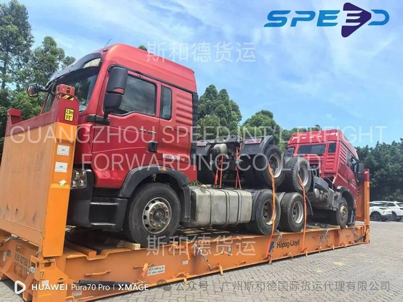 flat-rack-shipping-two-heavy-tractor-trucks