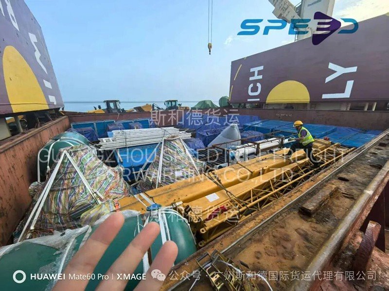 construction-machinery-parts-loading-into-hold